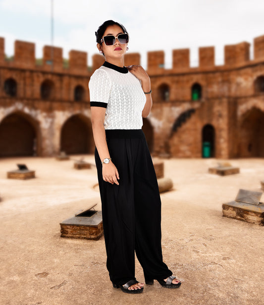 White Knitted Crop Top with Black Trousers