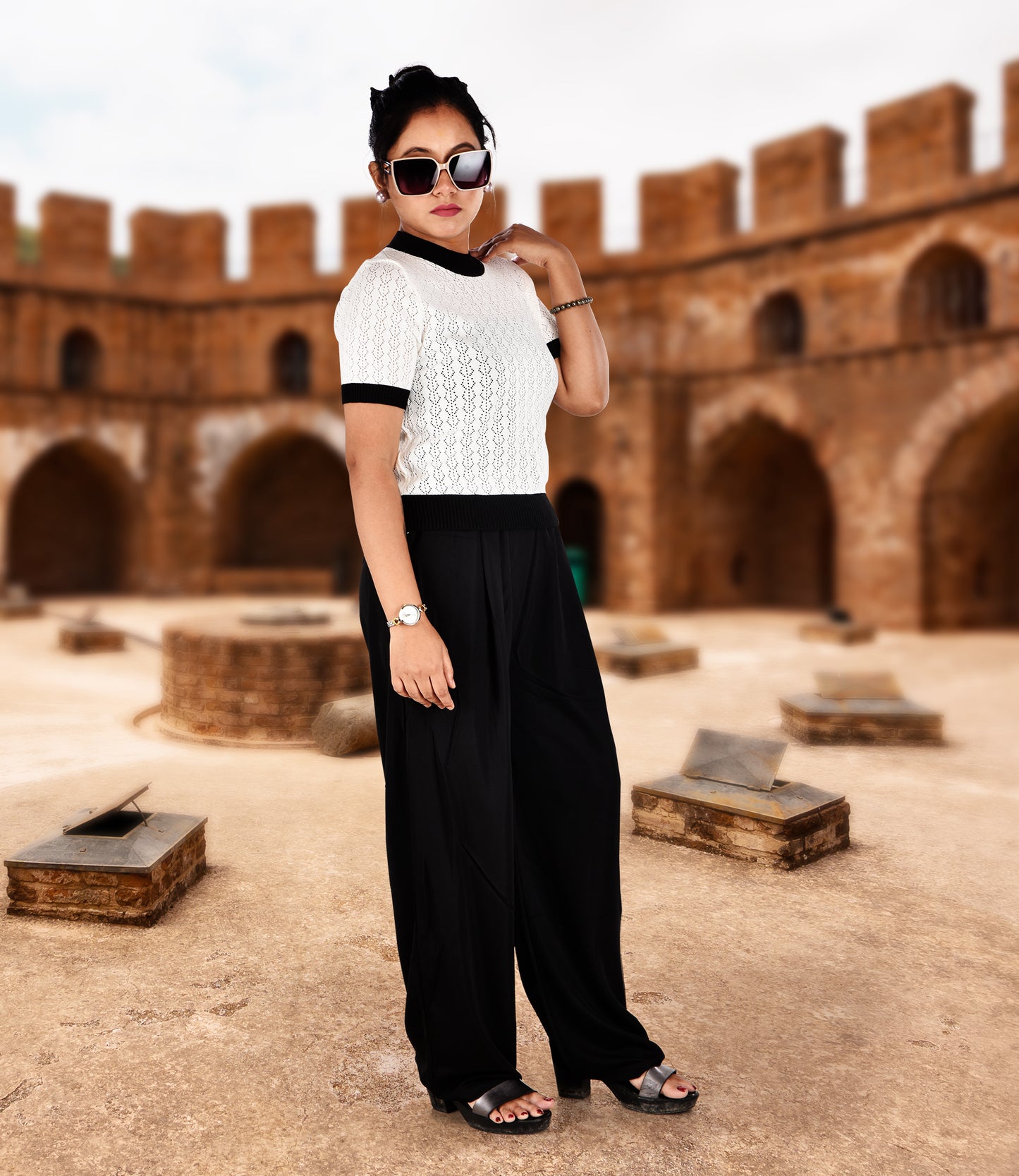 White Knitted Crop Top with Black Trousers