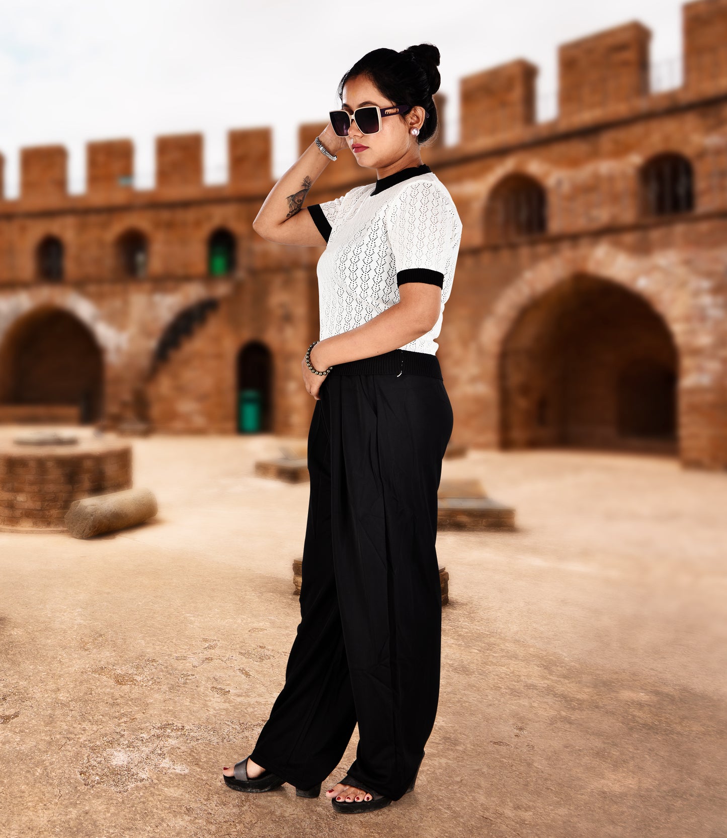 White Knitted Crop Top with Black Trousers
