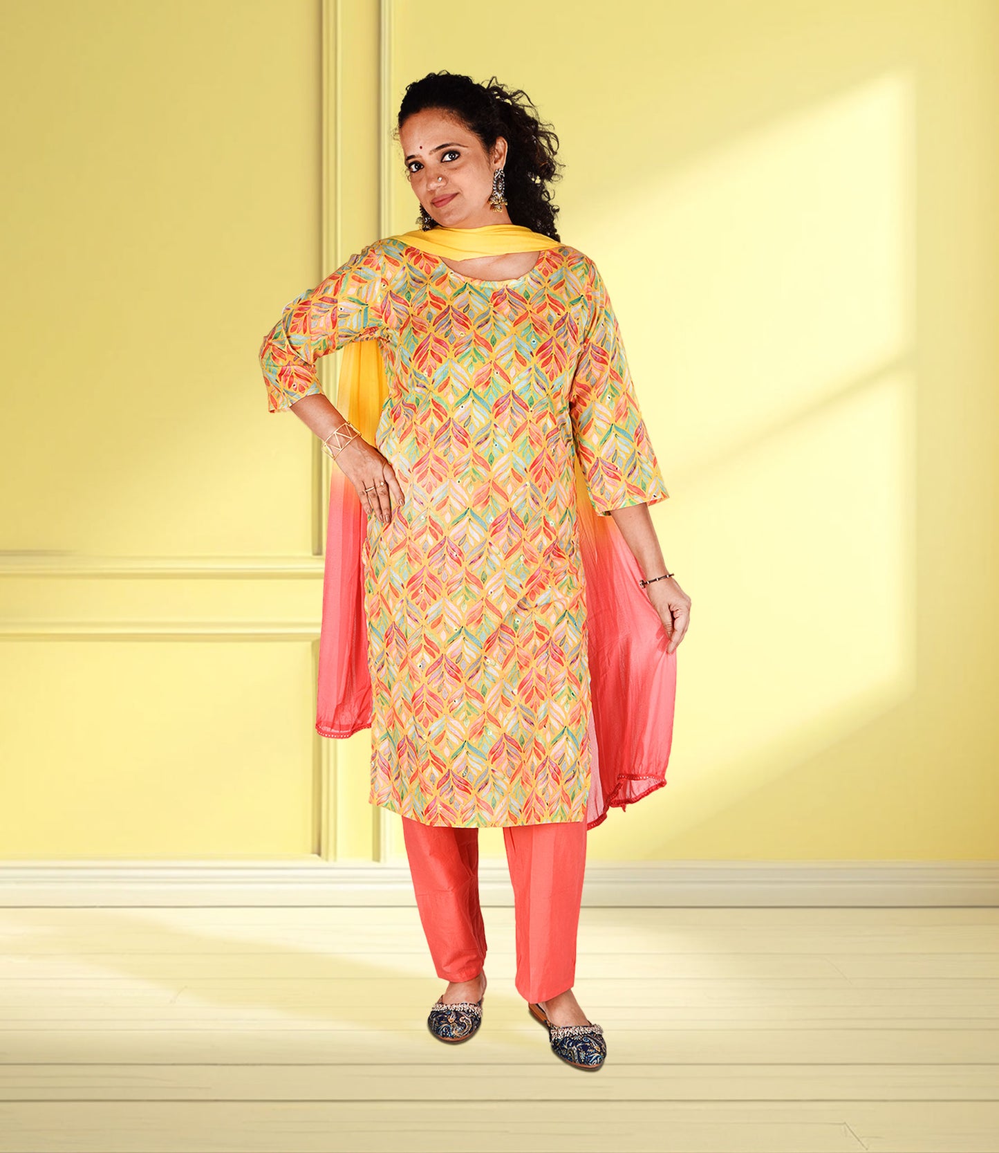 Yellow Based Multi Color Leaf Print Muslin Kurta Set