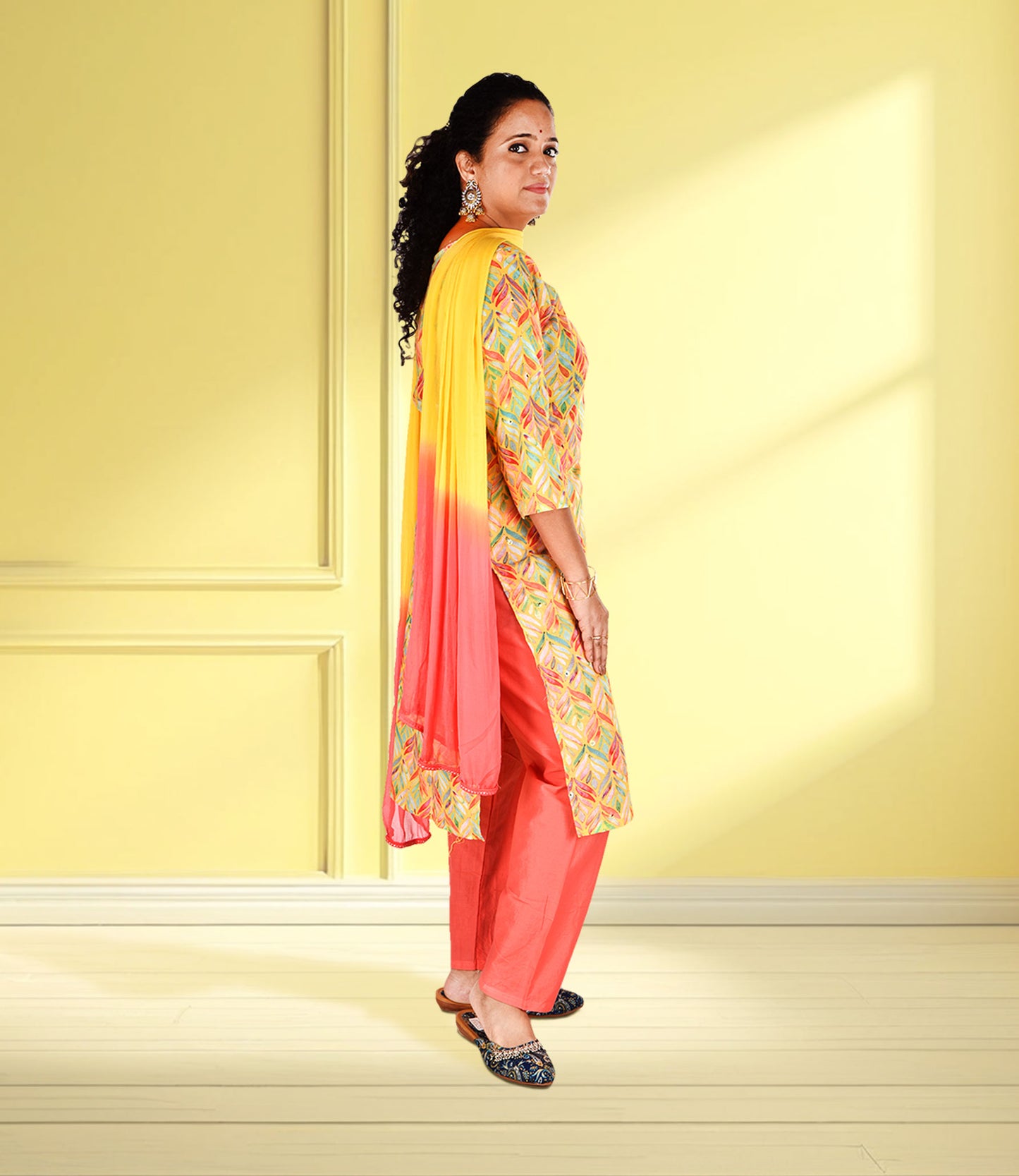 Yellow Based Multi Color Leaf Print Muslin Kurta Set