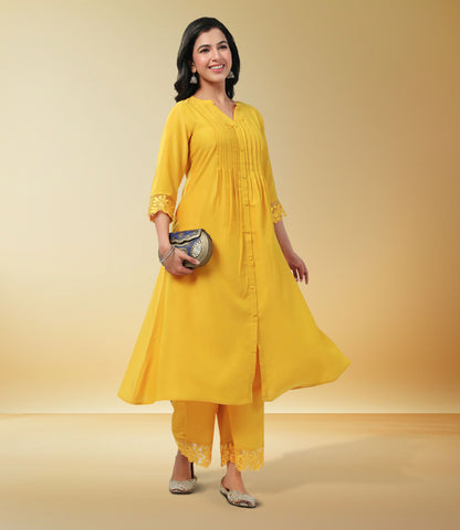 Yellow Muslin Solid Pleated A-Line Kurta Set