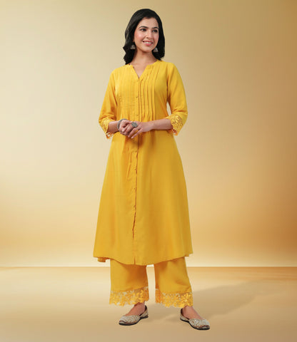 Yellow Muslin Solid Pleated A-Line Kurta Set