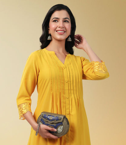 Yellow Muslin Solid Pleated A-Line Kurta Set