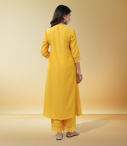 Yellow Muslin Solid Pleated A-Line Kurta Set